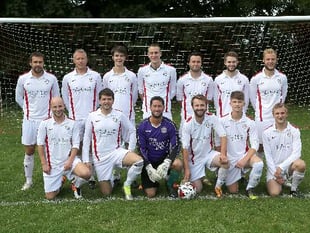 Town defeated in high-scoring encounter