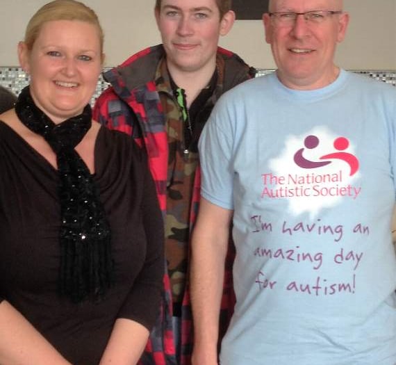 Scott sports pink mohican for Autism Awareness Month