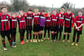 KM Utd U10s give coach something to smile about