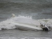 RNLI lifeguards rescue two after RIB capsizes