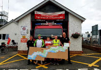 Young lad visits eight South Hams fire stations as part of 525-mile challenge