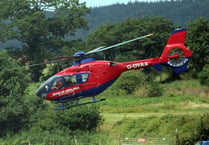South Hams road shut after air ambulance and police called to crash