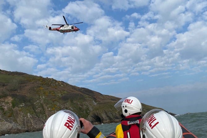 Crew in Dart RNLI lifeboat at scene of Search and Rescue Helicopter