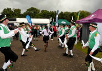 The Morris men are out and dancing all about 