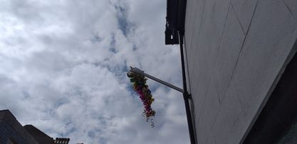 What does the Hanging the Glove Ceremony mean at Fair Week