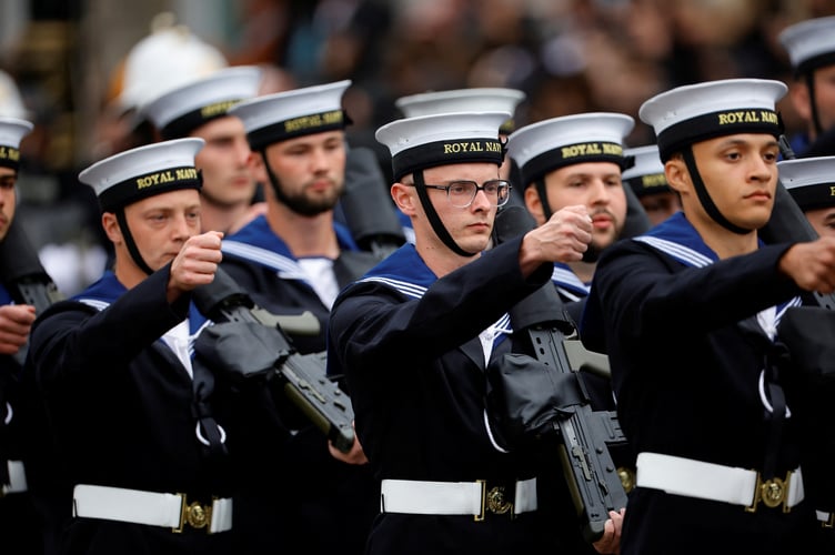 Members of the Royal Navy march before the Ceremonial Procession for the State Funeral of Queen Elizabeth II, held at Westminster Abbey, London. Picture date: Monday September 19, 2022.