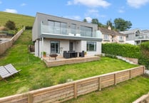 This modern home features gorgeous views and a Wi-Fi kitchen 