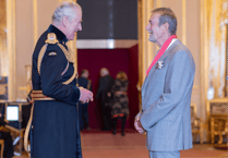 Former CEO presented with CBE in intimate Windsor Castle ceremony 