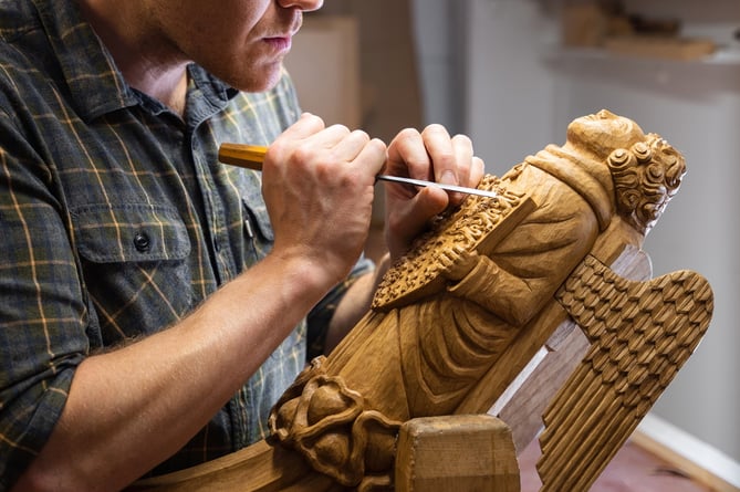 William carving a Westminster Hall angel