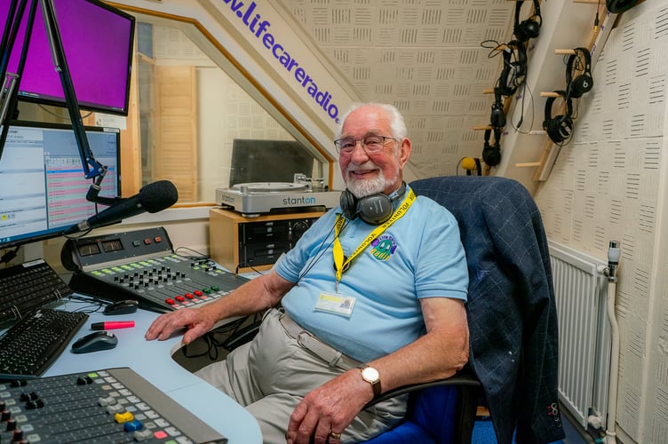 John Cavie, the worlds oldest radio DJ captured at the Life Care Radio Station in Totnes, Devon. See SWNS story SWLNdj. A Brit has been hailed as the world's oldest music radio DJ - still hosting a regular radio show aged 95. John Cavie has been presenting on Life Care Radio at Totnes Hospital in Devon for a decade. The former timber surveyor turned 95 on Monday (28/8) making him the oldest music radio presenter on the planet. Walter Bingham, 99, from Israel has been named by Guinness as the world's oldest talk radio host - but John is thought to be the oldest radio music show host.