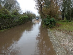 Drivers warned to slow down on flooded roads