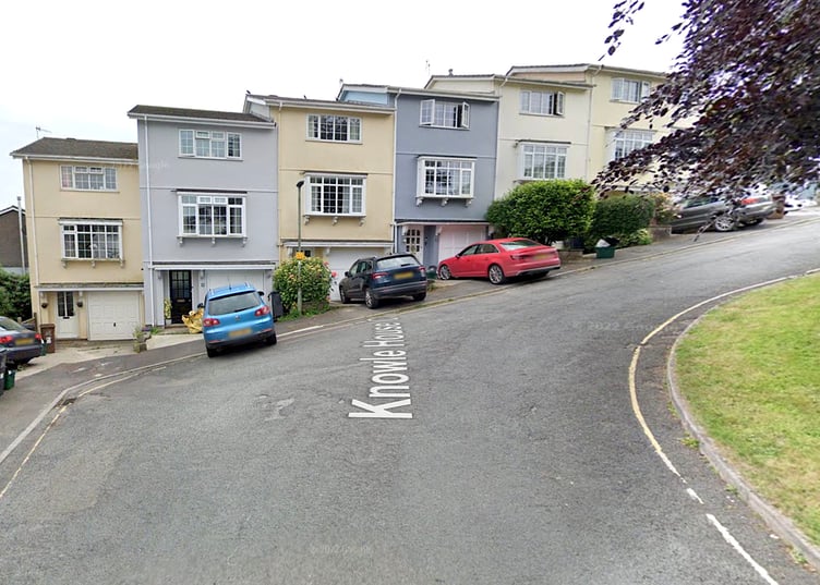 A Google Street View of Knowle House Close and parked vehicles