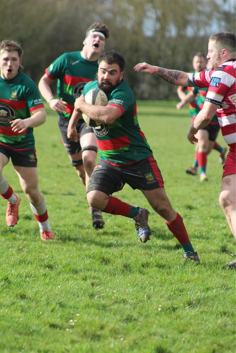 Dartmouth's Capt Karl Caunter leads the Darts attack
