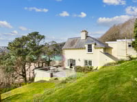 "Fabulous" cottage for sale has beach views and woodland gardens