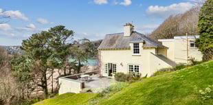 "Fabulous" cottage for sale has beach views and woodland gardens