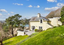 "Fabulous" cottage for sale has beach views and woodland gardens