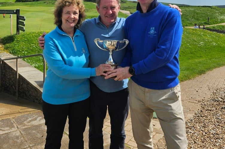 John Batchelor trophy winners Sue and Alec Esplin, alongside club captain Jim Stewart