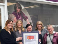 Care company celebrates triple success