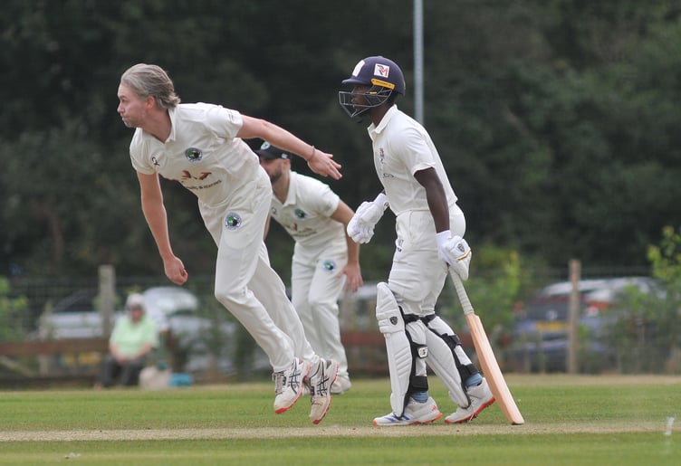 Devon Cricket League Premier Division. Bovey Tracey versus Bradninch & Kentisbeare. Bradninch bowler Mitchell Pugh and Bovey batsman Musa Twala