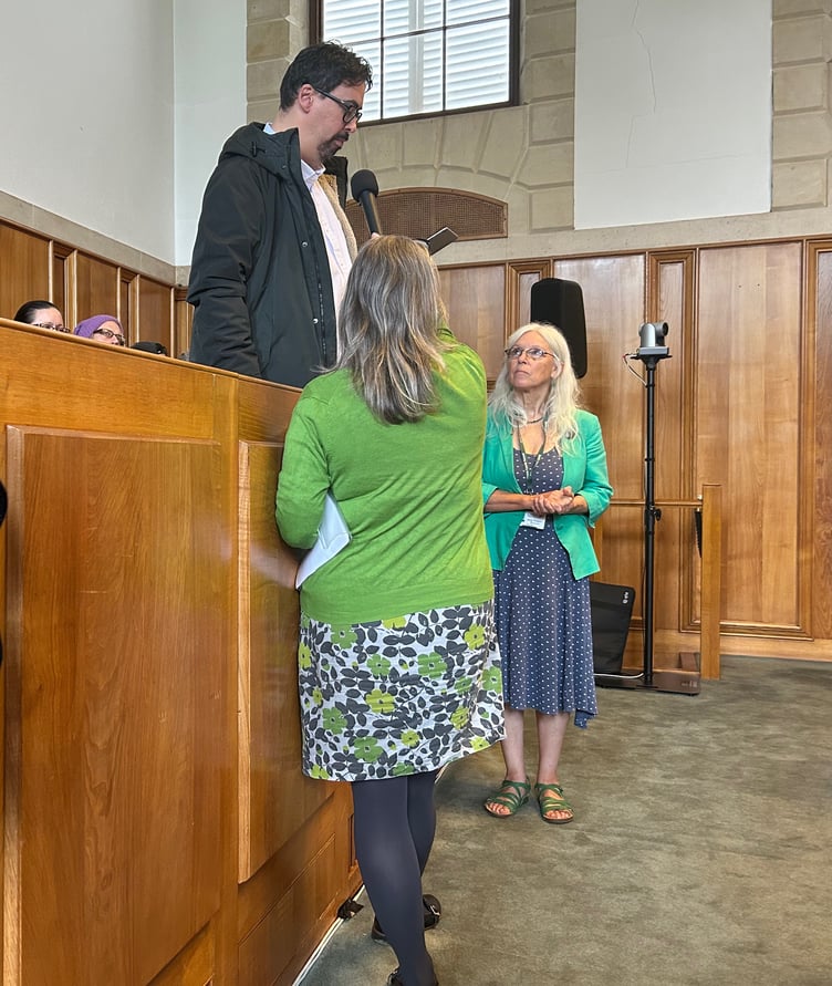 Totnes councillors Tobias Robshaw (left) and Jacqi Hodgson (right) handed a petition with more than 1,200 signatures