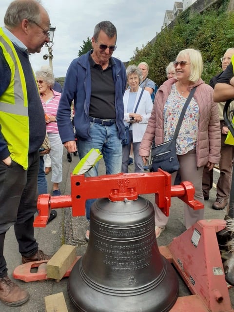 Villagers welcome their church bells