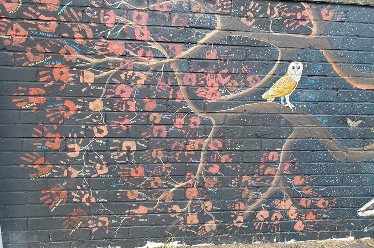 Harbertonford Primary Schools mural - Student hand prints 