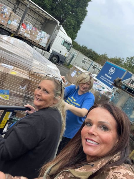 Founder Ali Piper and her team help with the loading