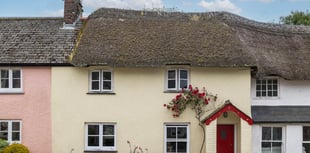 Period cottage for sale overlooking stream is full of "timeless charm"