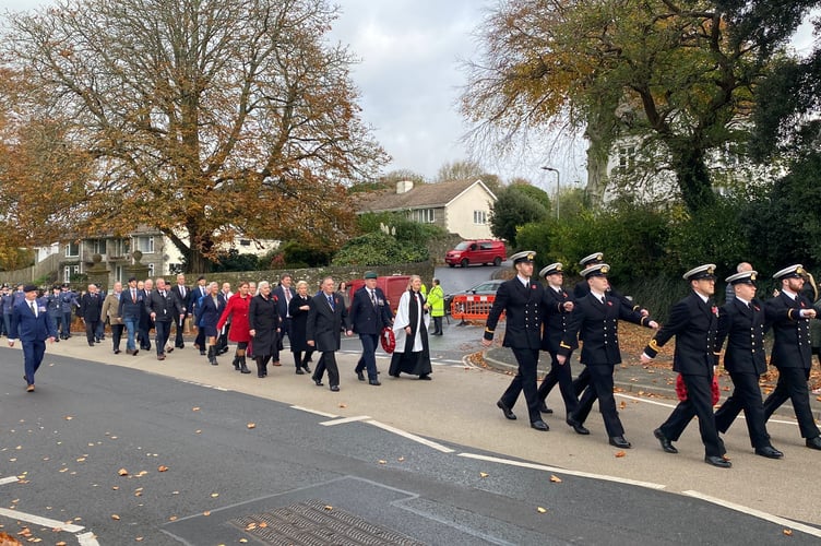 The march past led by the Royal Navy