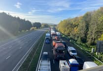 Overturned vehicle on A38