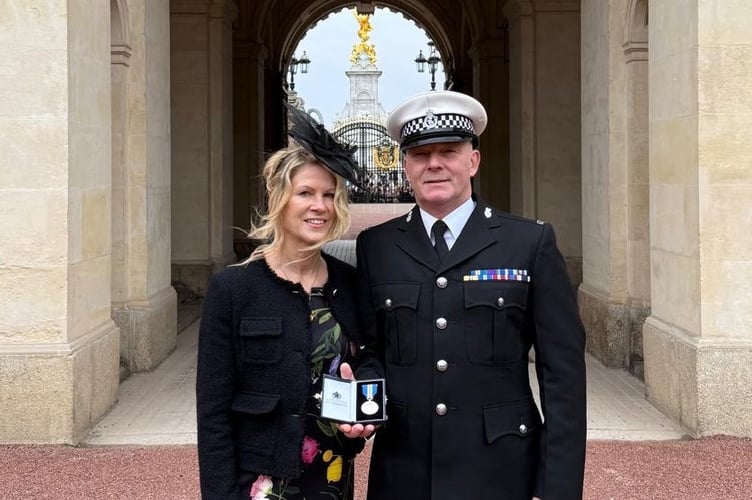 Former police officer Zach printer attended the investiture ceremony with his wife and sons