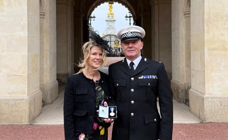 Former police officer Zach printer attended the investiture ceremony with his wife and sons