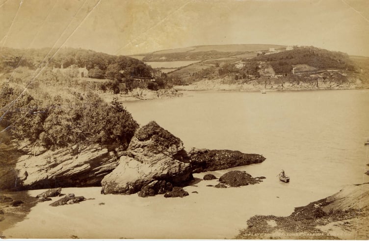 Splatt Cove,view northwards across South and North Sands towards Salcombe. Man in small boat near shore.