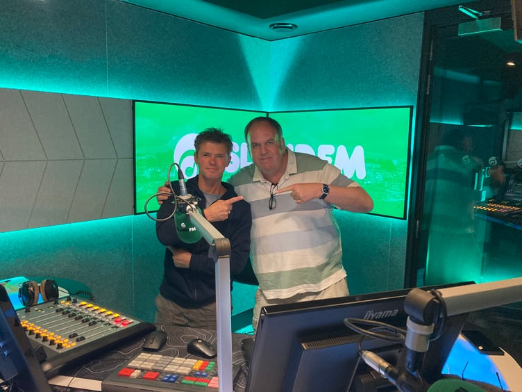 Reporter Richard Harding (right) with Island FM's longest-serving presenter Carl Ward