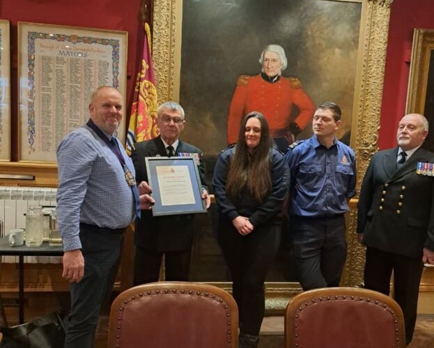 Mayor Cllr David Wells makes presentations to members of HM Coastguard