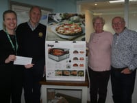 Dartmouth Rotary Club bring pizzas to children in hospice