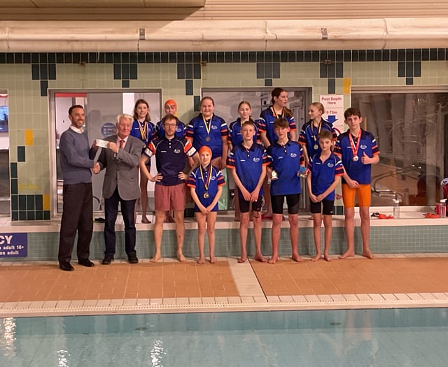 Freemasons support swimming club with donation