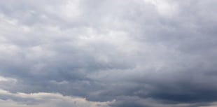 Light winds with partly cloudy skies and possible afternoon rain