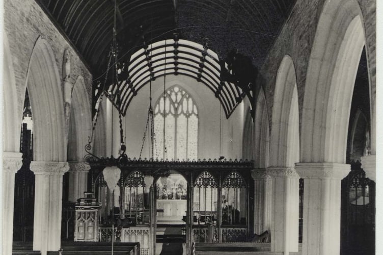 Black & white postcard.  Interior of St Michael and All Angels Church, Stokenham