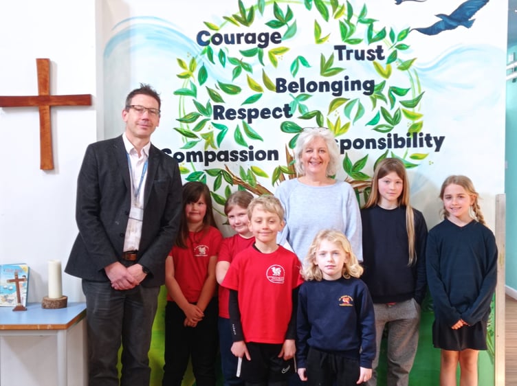 Headteacher Jack Pemberton with Caroline Voaden and pupils