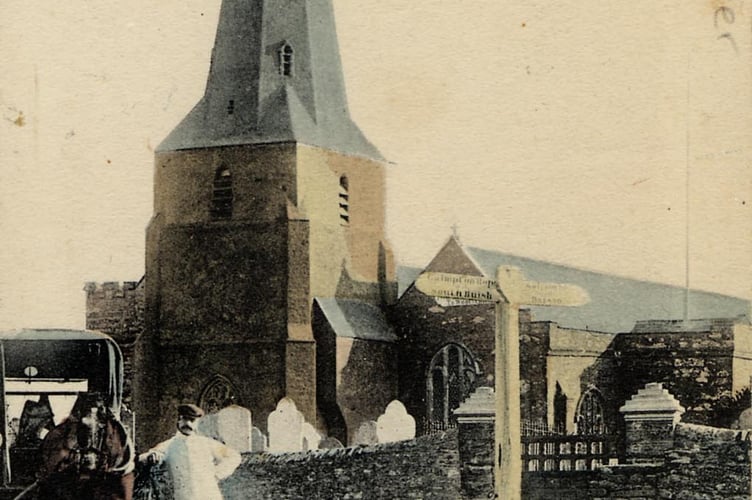 A roundsman with delivery van in front of Malborough church, signpost to Galmpton around 1900.