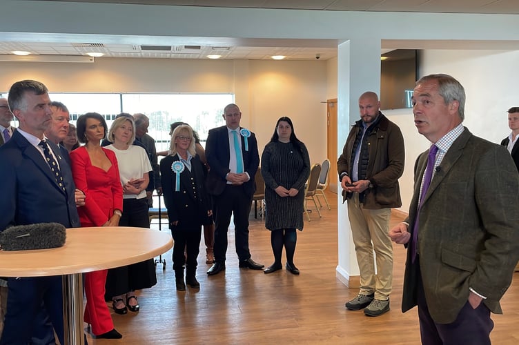 Mr Farage answering questions from candidates