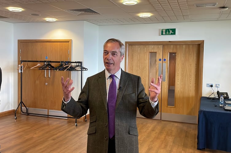 Mr Farage speaking to candidates and supporters
