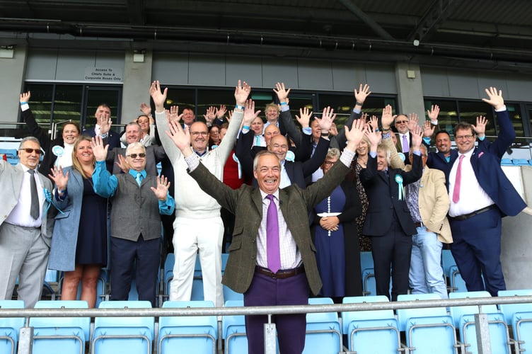 Nigel Farage with almost 50 of the Devon Reform candidates in the stands at Sandy Park