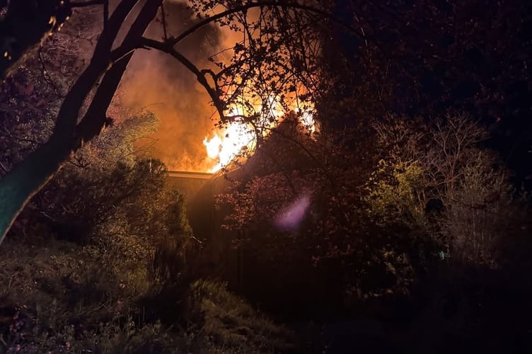 Roof fire well under way on Kilworthy Hill, in Tavistock.