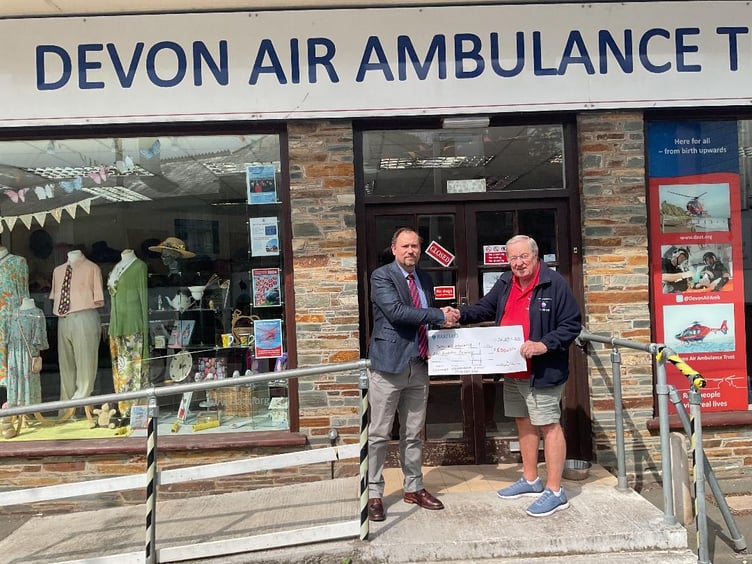 From left: Oliver Williams, Master of Duncombe Lodge in Kingsbridge and Rex Brown, representing Devon Air Ambulance Trust.