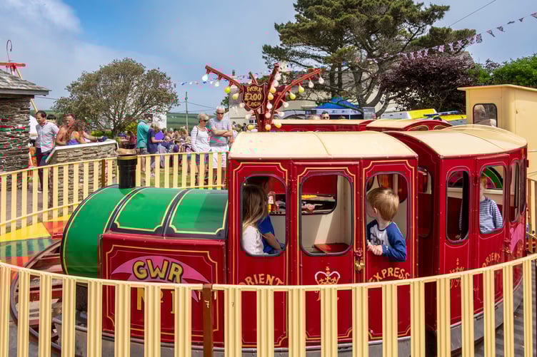 Old fashioned fairground rides at East Prawle fair, Devon