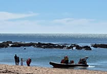 Paddleboarders caught by offshore winds at South Milton