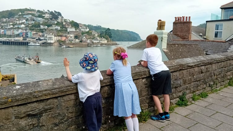 The children pause to enjoy the view