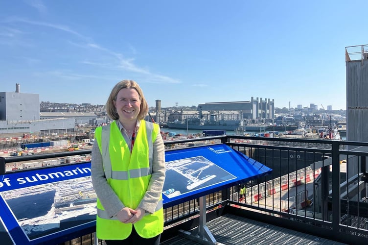 SW Devon MP Rebecca Smith (pictured in Devonport Naval Base) has hit out at the government's defence plans as unrealistic without funding.